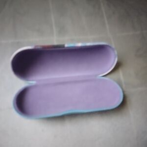 Disney's Frozen sunglasses case.  The colors are muted.  Purple and blue